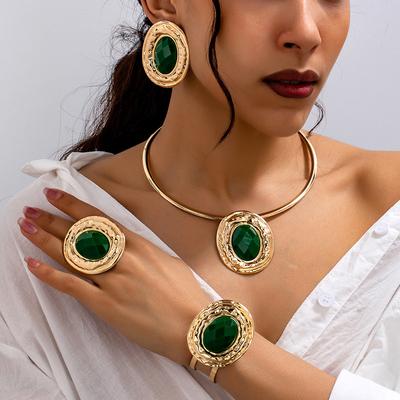 Ensemble de boucles d'oreilles, collier, bague et bracelet à disque exagéré à la mode