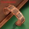 Vintage Leder Armband mit breitem Bündchen für Damen mit geometrischem Design und Herbst-Stil