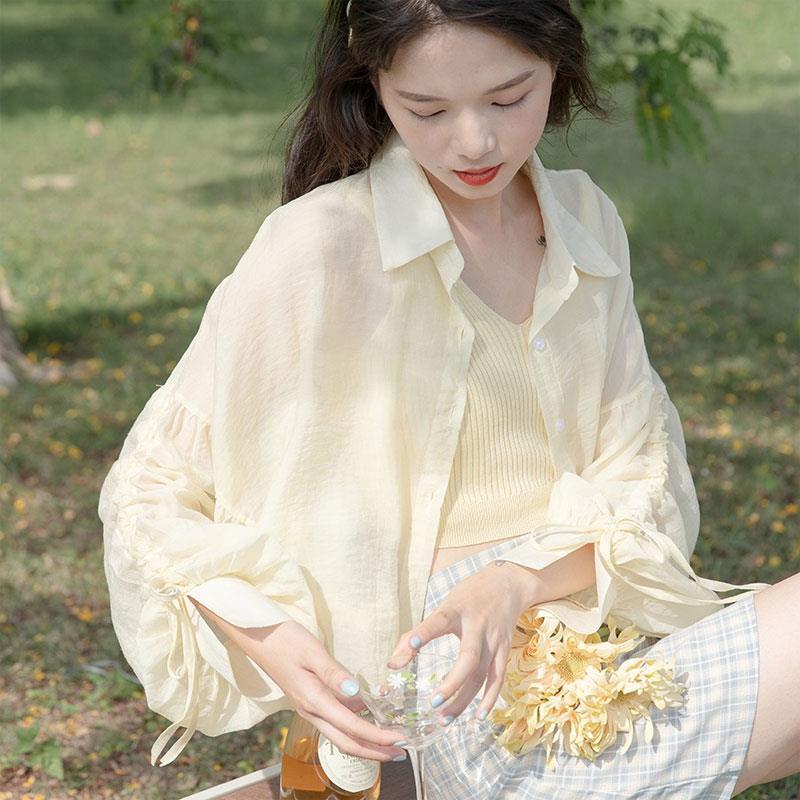 Manteau de protection solaire en mousseline de soie pour femme, style fin en été avec protection UV, un sens du design, une niche et un nouveau haut court