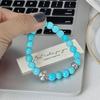 Retro Imitation Türkis Perlen Kreuz Armband Damen Nische High-End Gefühl Gestapelt Tragen Kalter Wind Vielseitig Temperament Schmuck