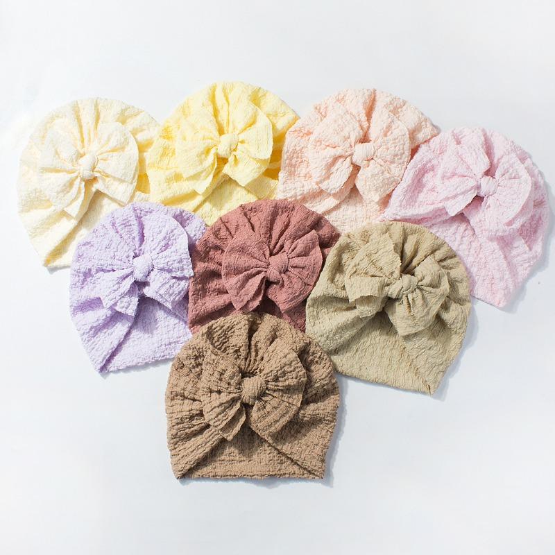 Neue Kinder-Überziehmütze, niedliche Schleifen-Babymütze, weiche und atmungsaktive Baby-Reifenmütze
