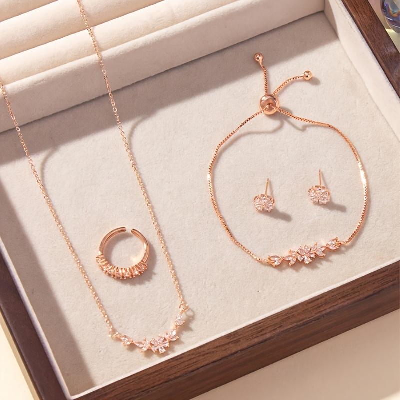 Simple and Stylish Zirconia Jewelry Set: Pendant Necklace, Adjustable Bracelet, Open Ring, and Earrings - a Perfect Holiday Gift