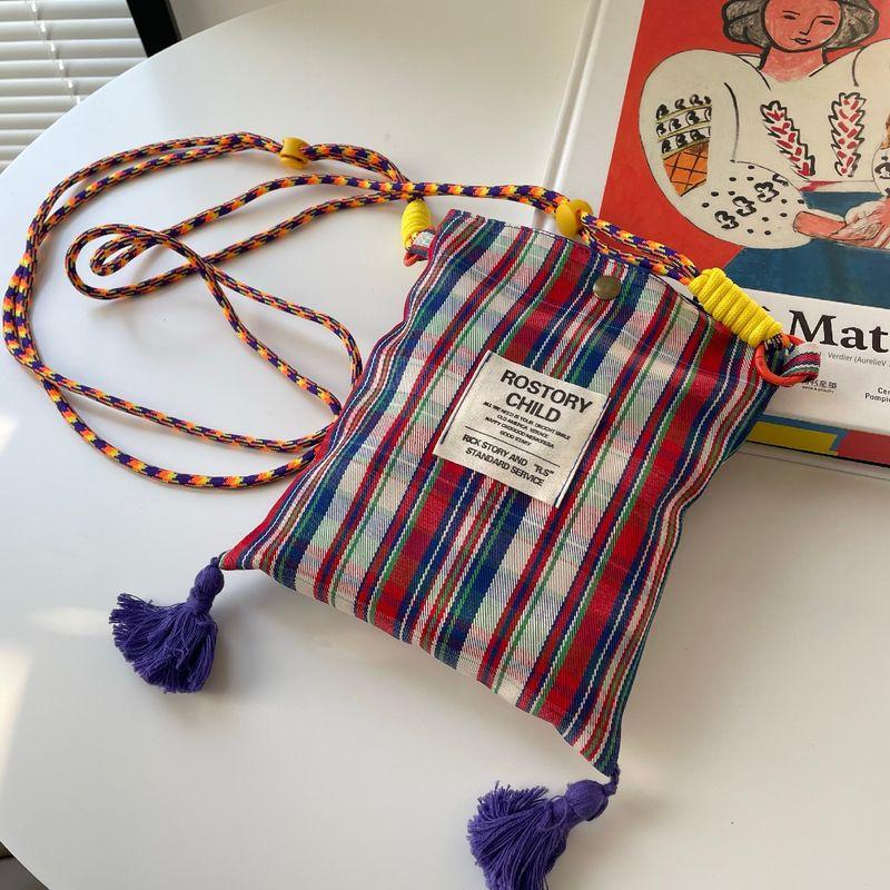 

2025 Spring New Arrival Retro Artsy Colored Plaid Special-Interest Design Mobile Phone Bag Mini Messenger Bag Tassel Bag Color lattice tassel concealed button