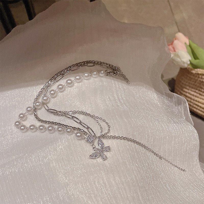 Romantic Escape Double-layer Bow Pearl Necklace Women's Light Luxury Niche Elegant Suit Collarbone Chain Neck Chain Tide