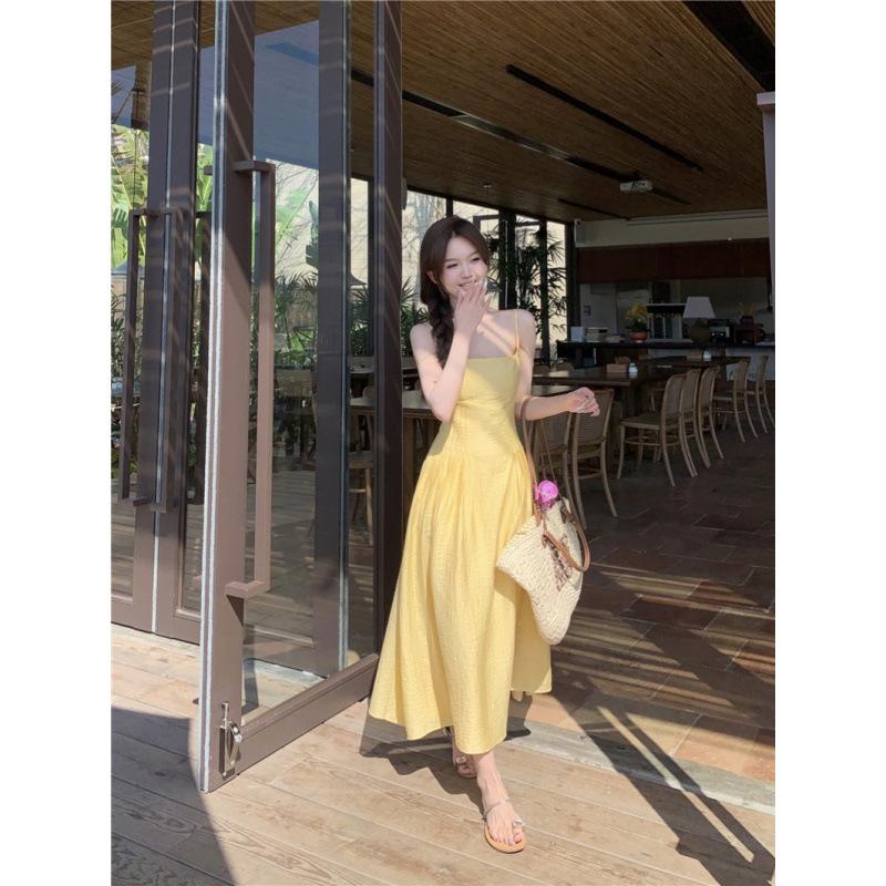 Small yellow suspender dress women's summer new waist temperament long dress seaside vacation skirt