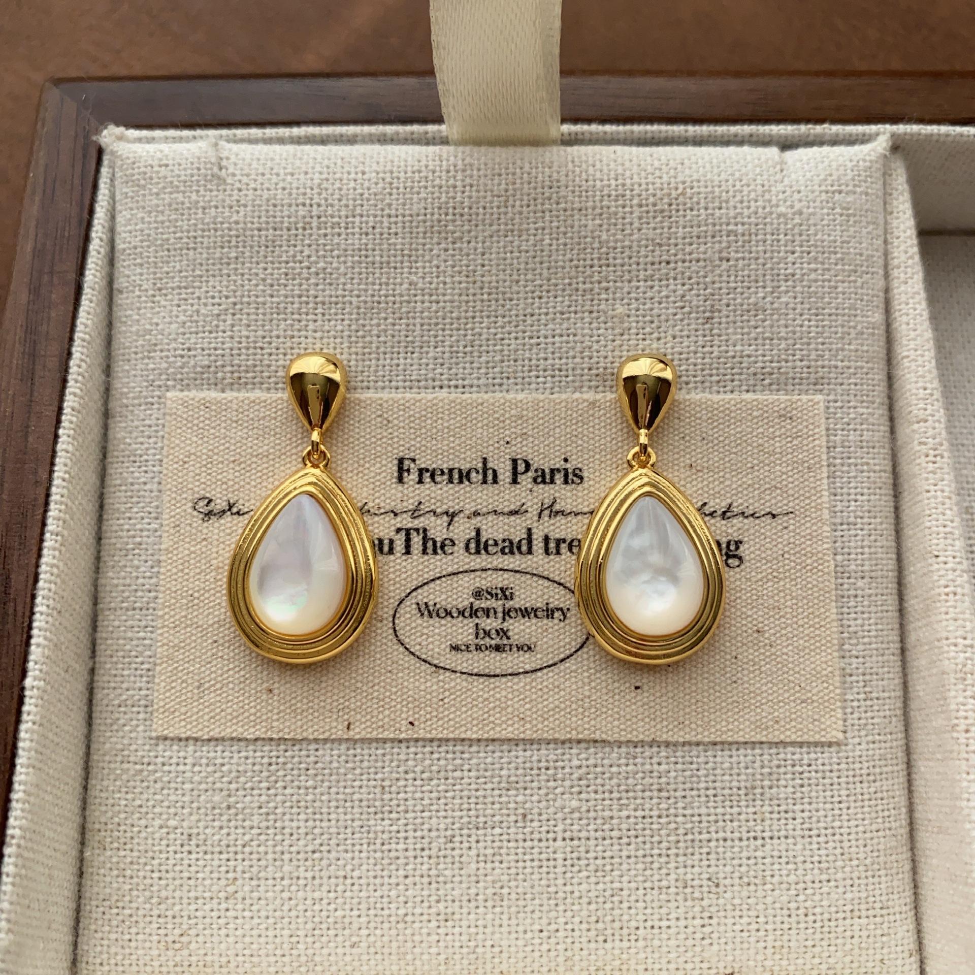

Fashion double-layer water drop fritillary stud earrings, light luxury, gentle and elegant temperament, advanced sense, daily versatile earrings