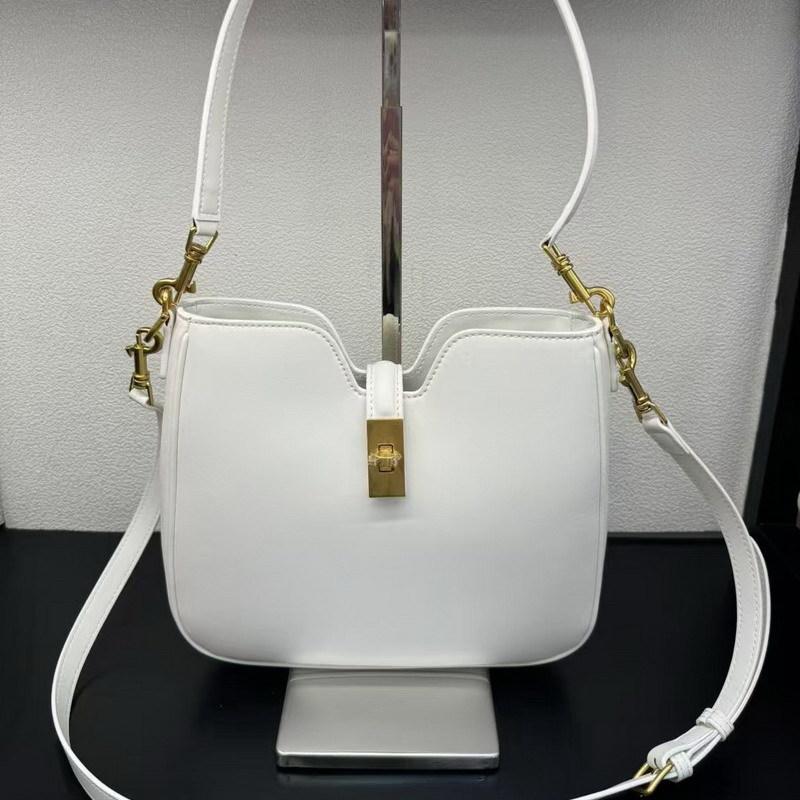 

2025 Новая женская сумка из натуральной кожи, кожаный чехол для головы, мягкая сумка-ведро для подмышек, одно плечо, диагональная сумка с перекрестными краями, маленькая сумка 24.5x21.5x5CM белый