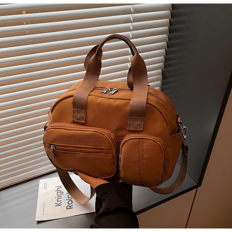 

Жіноча сумка 2025 новий тренд жіноча сумочка повсякденна на плече сумка-месенджер подвійна кишеня полотняна сумка-ракушка коричневий