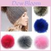 Luxe DIY damesmutsen met pompons van imitatie wasbeerbont