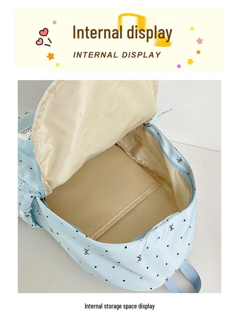 Polka Dot Bow Backpack for Teen Girls: Stylish and Versatile Schoolbag for Middle and High School Students.