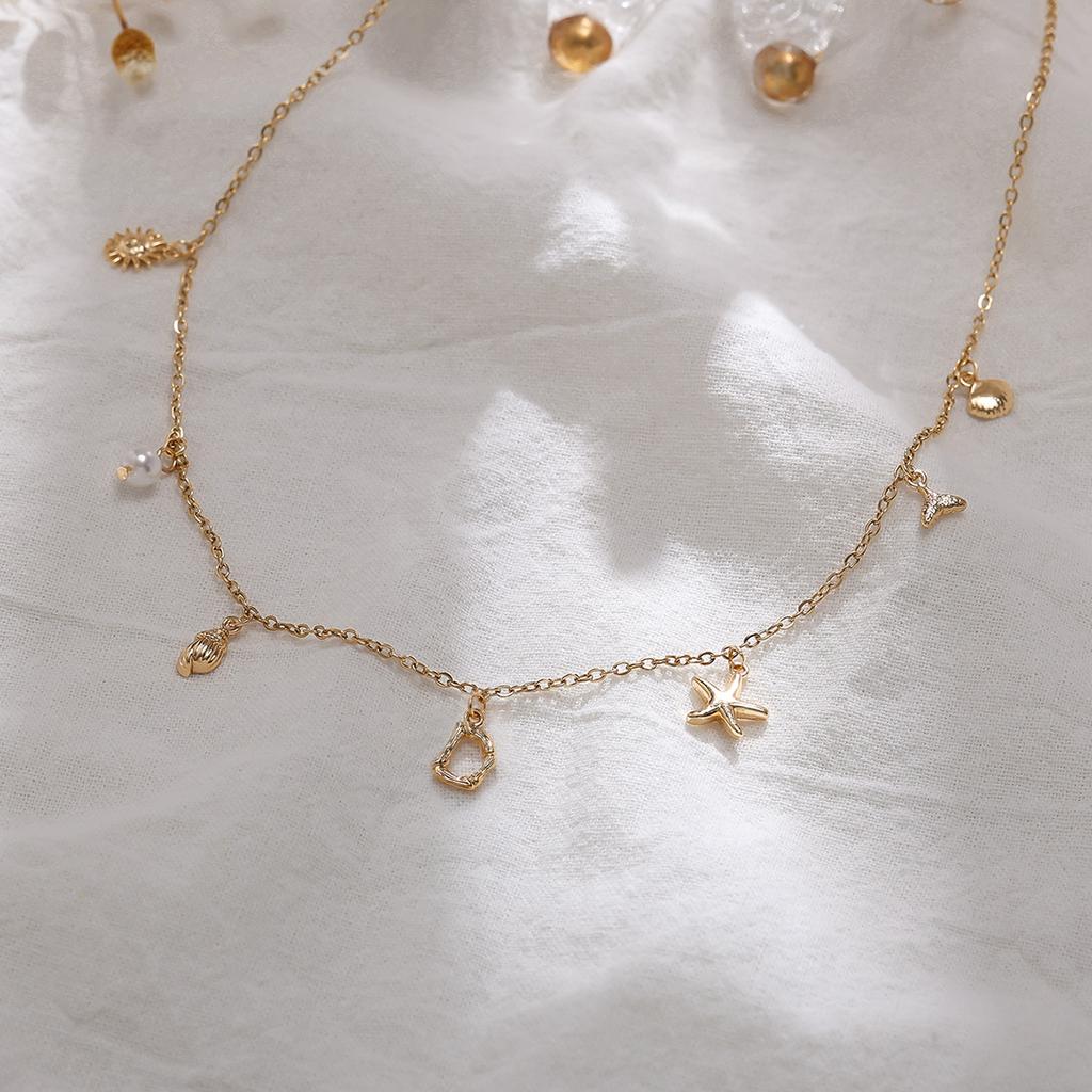 Einfache und modische Goldbuchstaben-Serie Meereskreaturen-Dekorationskette