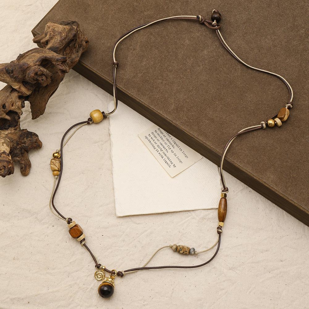 Original design retro light luxury natural hand-woven Tibetan necklace beaded tiger's eye stone pendant long sweater chain