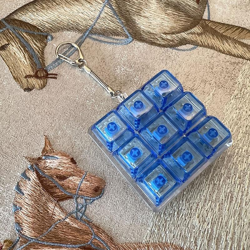 Tastiera a 9 Tasti Keycaps Portachiavi Giocattolo Fidget Keycaps Anti-Ansia Keycaps Festa Sollievo dallo Stress Keycaps Fai-da-Te Tappi Tastiera Giocattolo