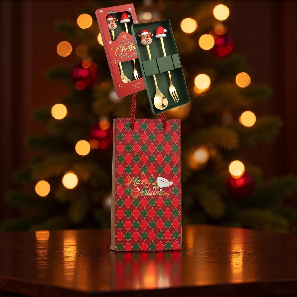 Christmas Cartoon Cutlery Set: Forks, Spoons, and Gift Box Featuring Cute Reindeer and Tree Designs.