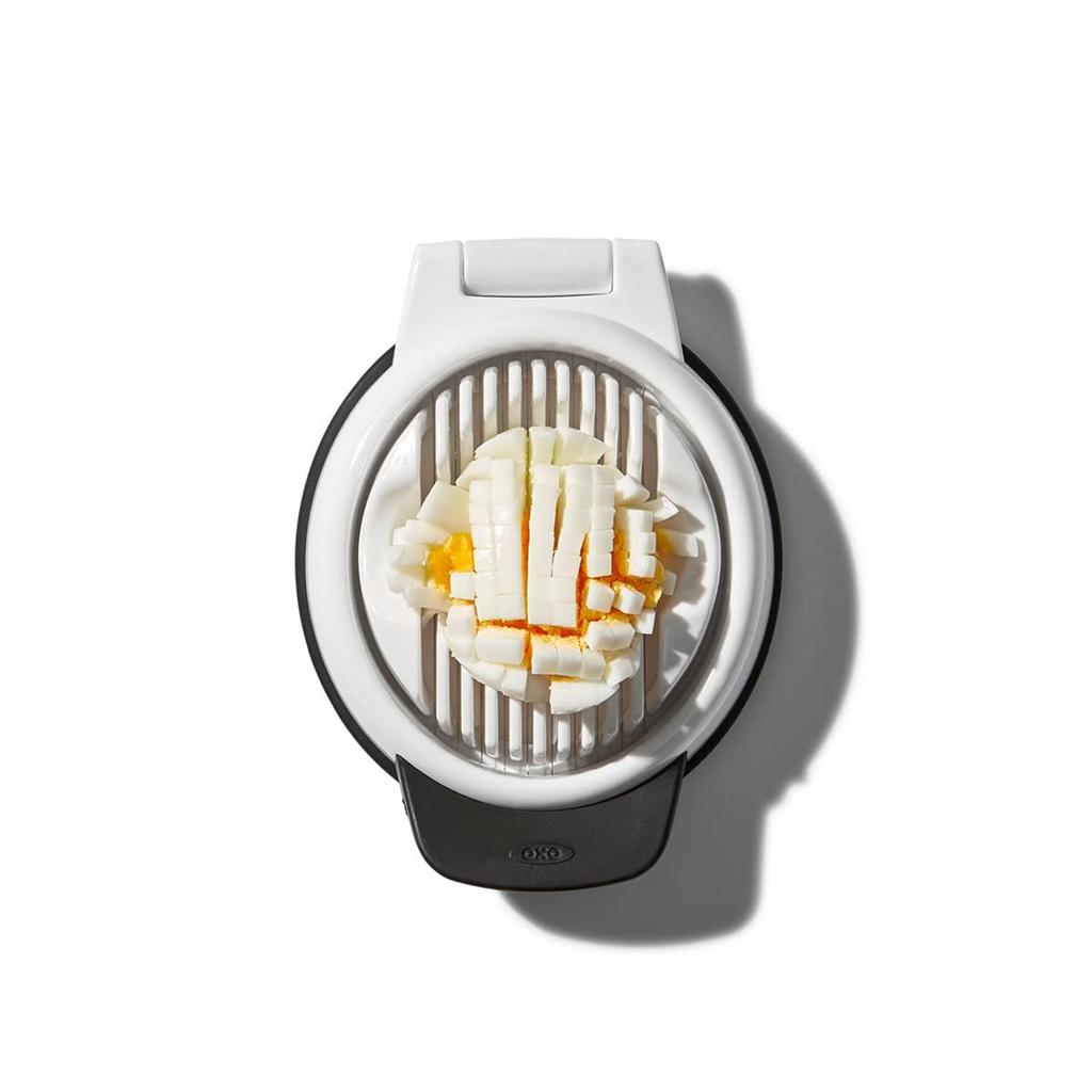OXO Simple Egg Slicer Cuts Boiled Cuts Eggs and Minces Easy To Cut Eggs Without Crushing Them Dishwasher Safe Eggs, Vertically, Horizontally,