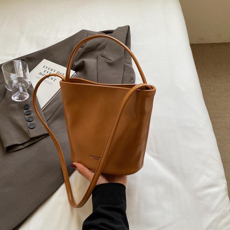 Retro red letter bucket bags for women versatile crossbody bag monochromatic shopping and travel women's bags new