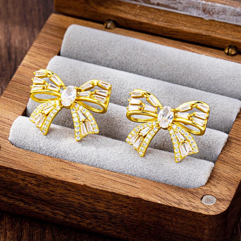 

Trendy Rhinestone Bow Cutout Stud Earrings - Women s Gold Design, Light Luxury Style