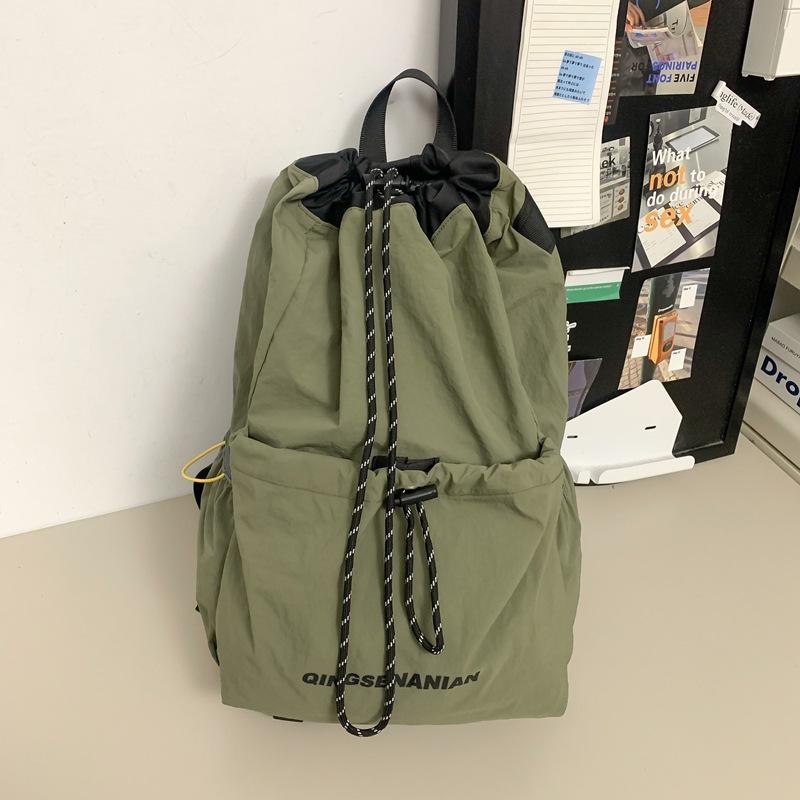 Solid color simple backpack, new drawstring outdoor, light sports and capacity, travel anti-splashing water-resistant wear-resistant and versatile