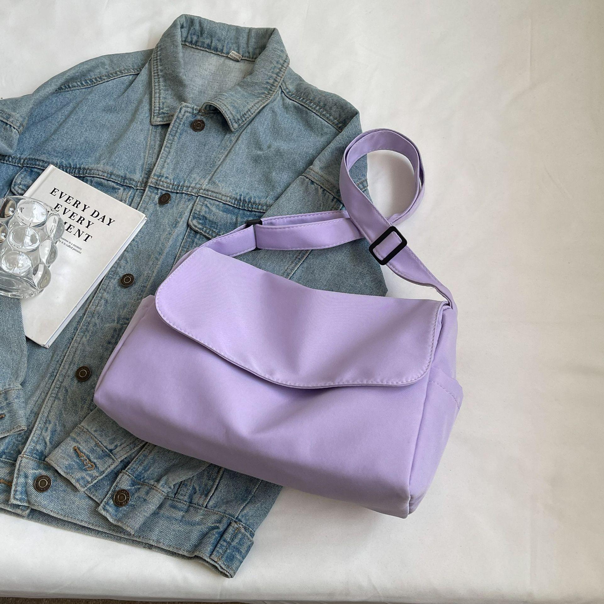 

Large capacity bag women s summer 2024 new canvas shoulder messenger commuter bag casual versatile class tote bag