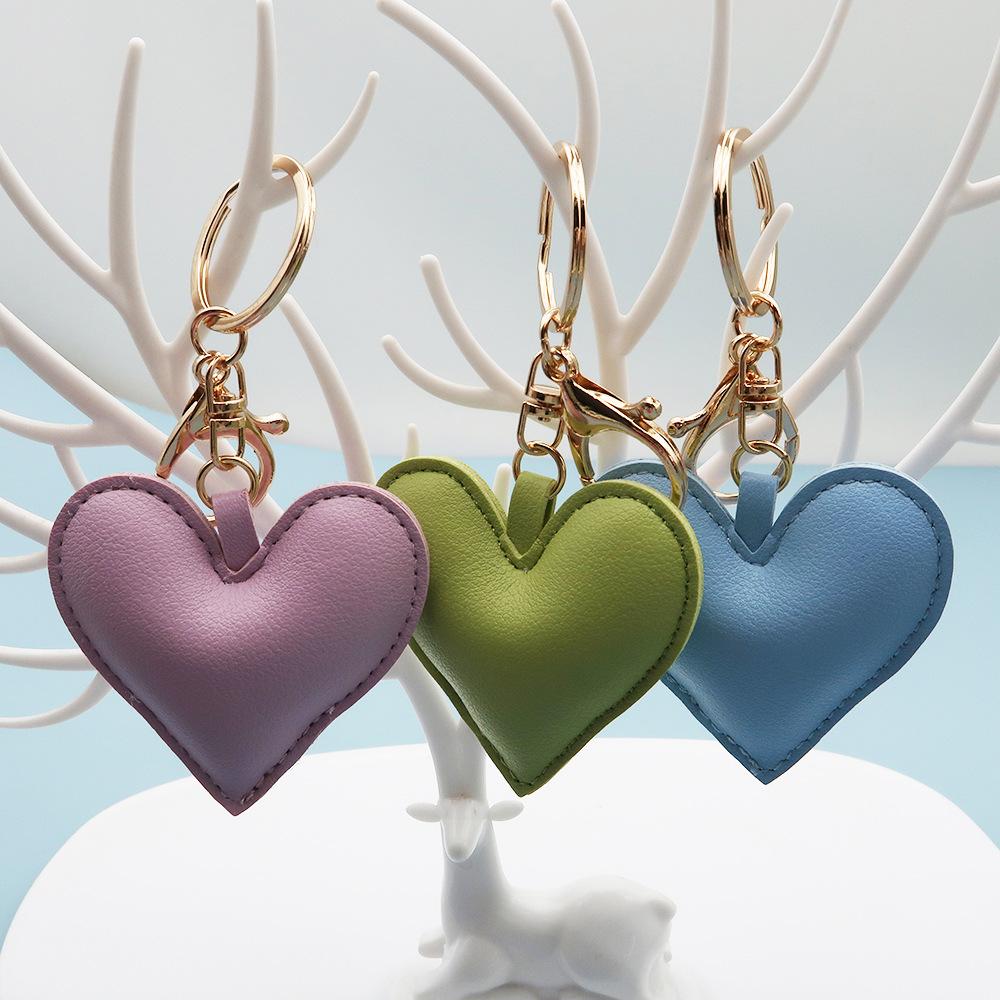 Spot wholesale PU simple peach heart bag pendant Xiaohongshu explosive love couple pendant keychain bag lanyard