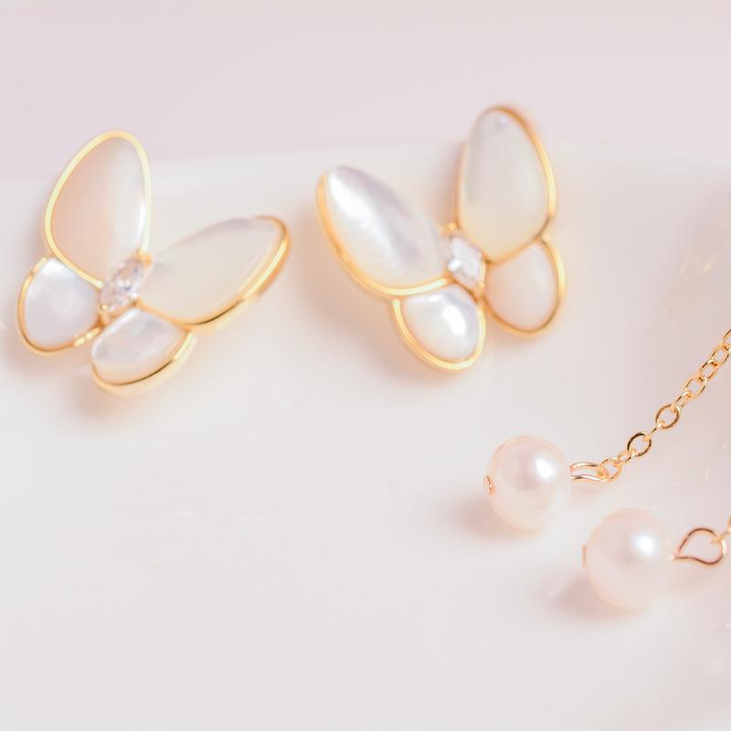 Korean version two wearing new natural freshwater pearl stud earrings women's S911 silver needle light luxury high-end butterfly earrings accessories