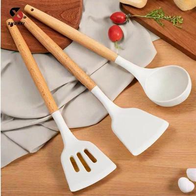 Set di utensili da cucina con manico in silicone e legno: Spatola antiaderente resistente al calore, spatola per friggere e cucchiaio per zuppa - 3 pezzi