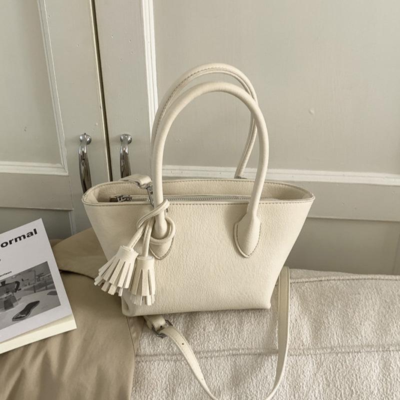 

Simple Handbag for Women 2026 New Tassel Crossbody Bag Spring and Summer PU Bucket Bag Mini(Max Length<20cm)