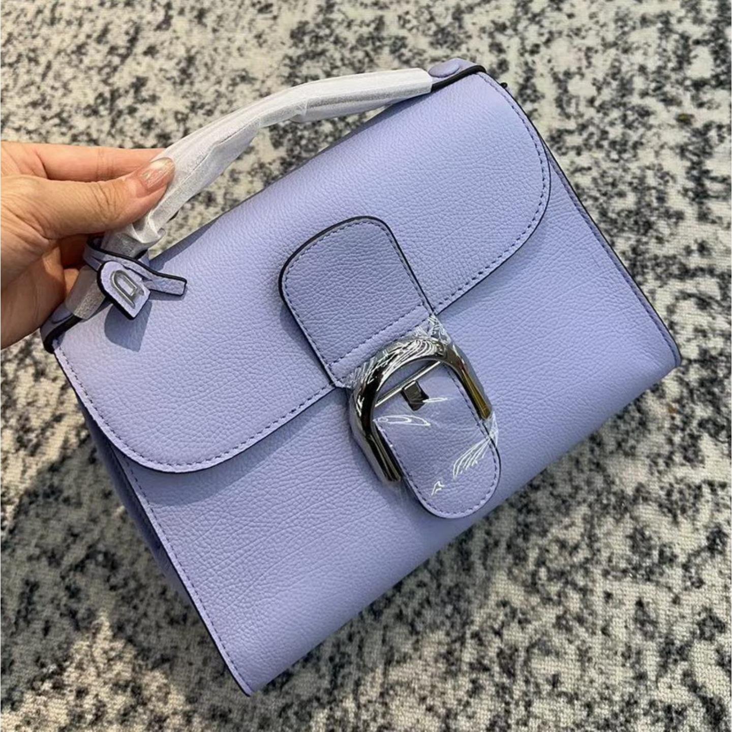 

New first-layer cowhide mini women s bag handbag small square bag messenger bag genuine leather women s bag versatile bag 23cm світло-фіолетового кольору