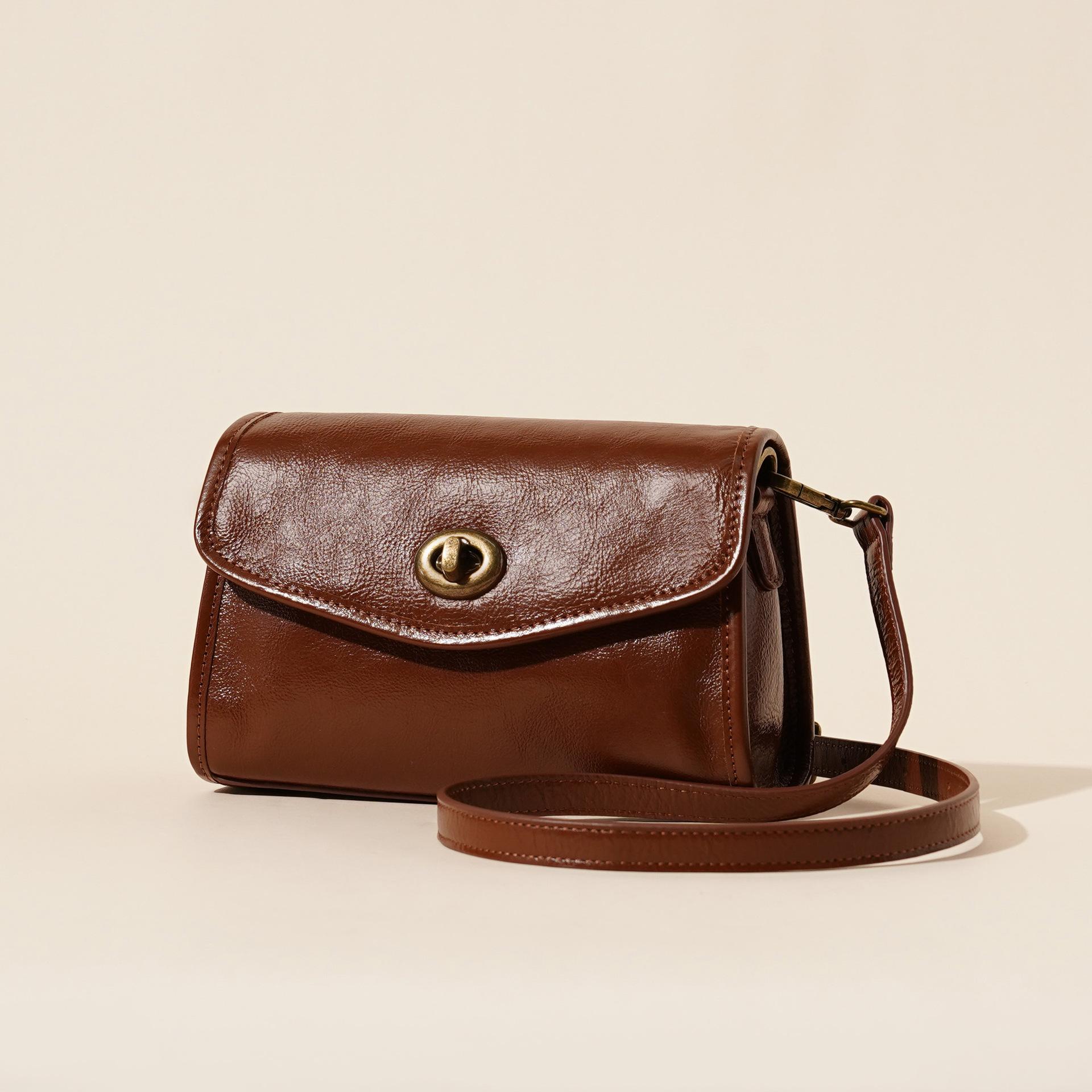 

First layer cowhide envelope bag spring and summer retro leather women s bag high-end sense simple and versatile portable shoulder messenger bag 21.5*8.5*13.5cm