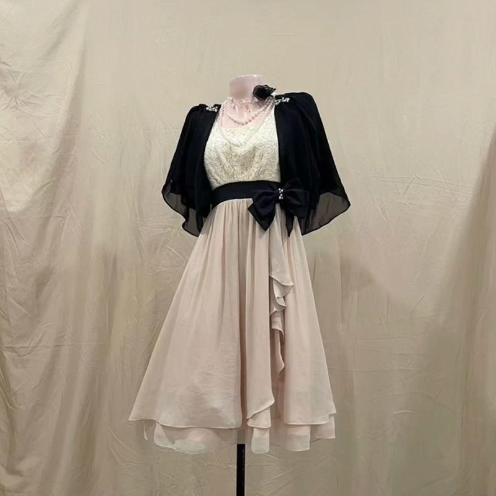 

Винтажный шик Кардиган из черного обсидиана и облегающее платье S