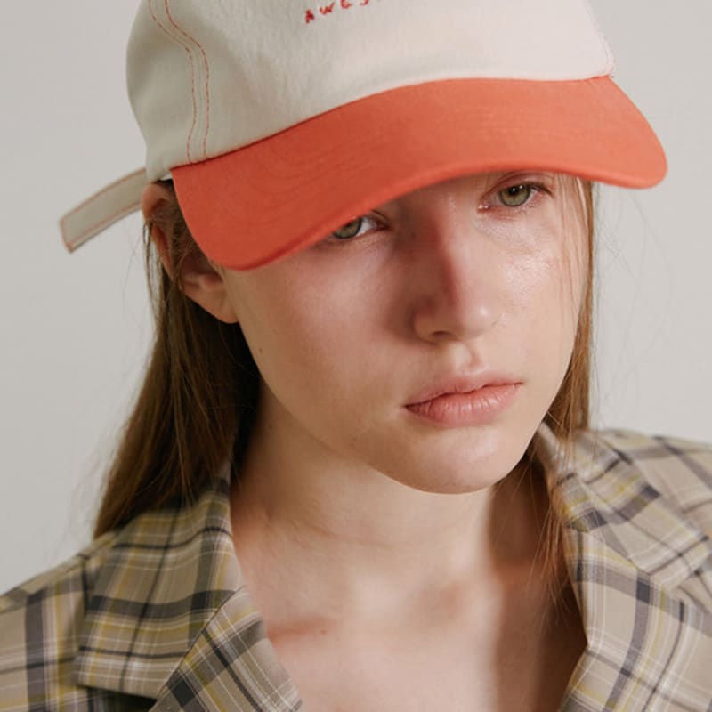 

AWESOME NEEDS TINY LOGO CAP_CREAM CARROT FREE