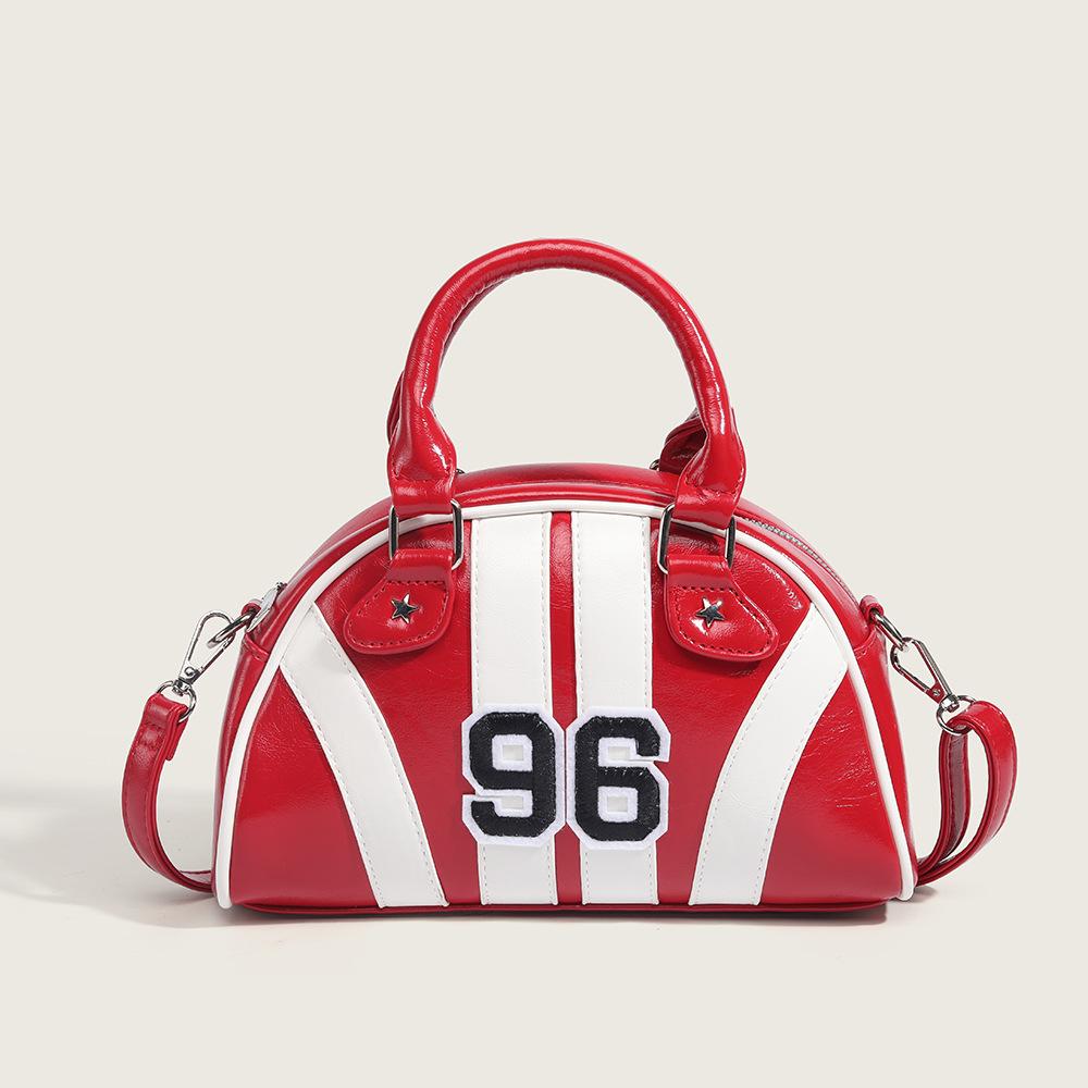 Red hard and three-dimensional striped tote bag with a sense of luxury, suitable for crossbody or hand-held use.