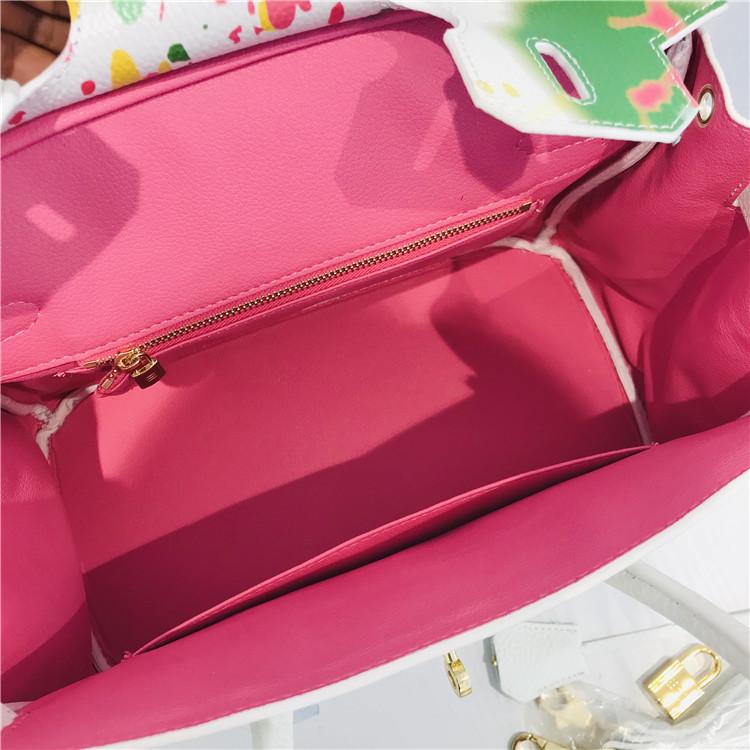 2021 New platinum bag first layer cowhide painted spray painting graffiti bag portable shoulder messenger bag personalized women's bag tide