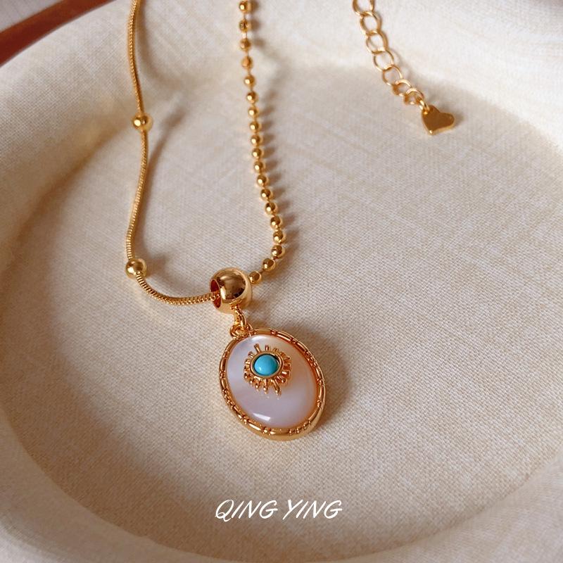 Retro Turquoise Shell Pendant Necklace with Layered Red and Blue Beads