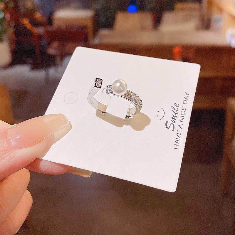 Adjustable Pearl Ring - Exquisite Korean Style, Light Luxury Niche Design, Elegant Micro-Inlaid Index Finger Ring.