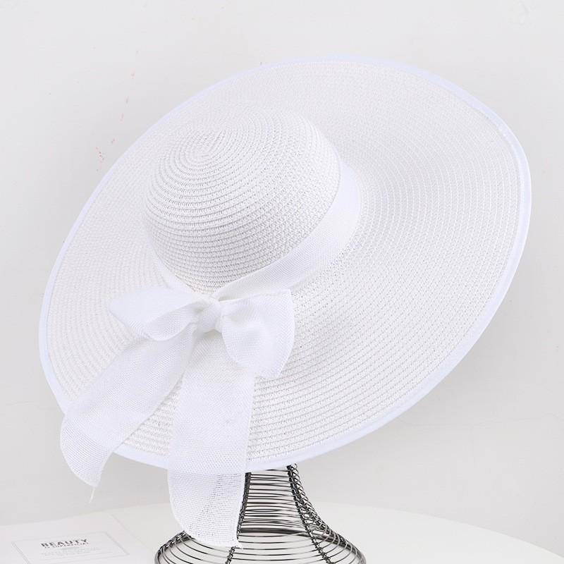 Cappello di paglia a tesa larga da donna estate protezione solare cappello a tesa larga da mare cappello da spiaggia con fiocco cappello da sole