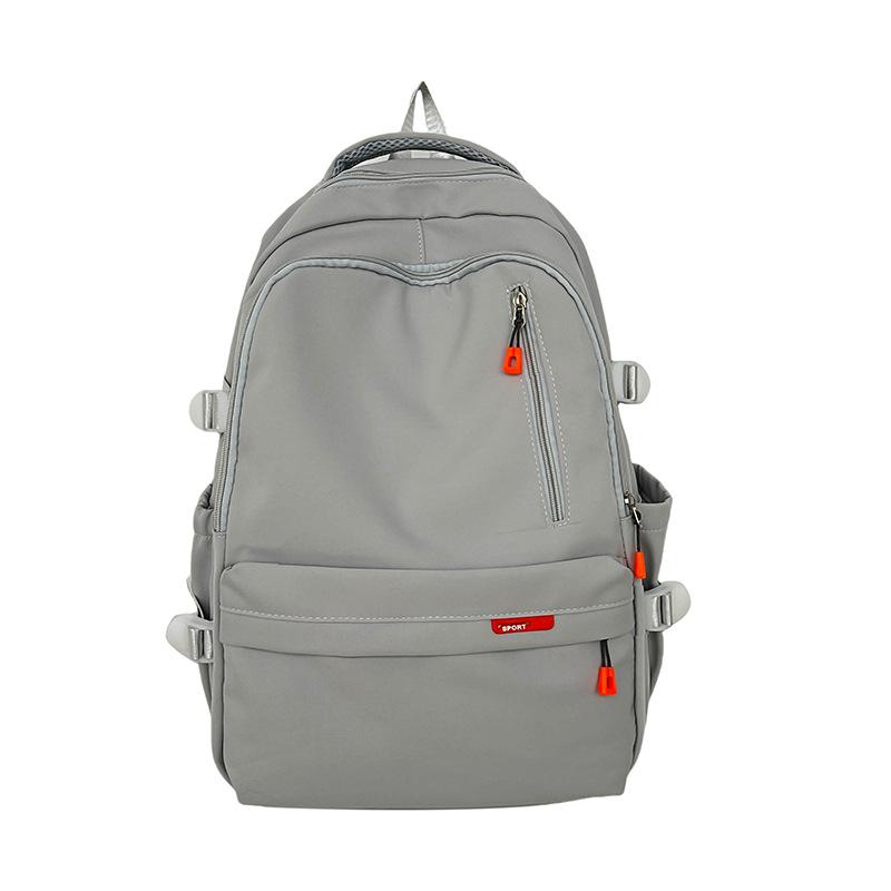 

Fashion new backpack large capacity junior high school students lightweight burden reduction schoolbag waterproof and wear-resistant back сірий колір