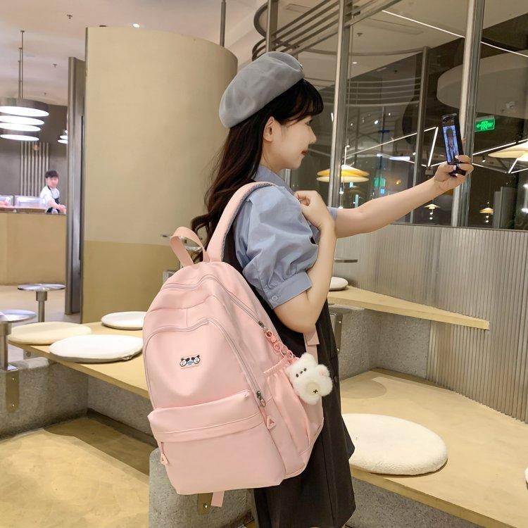 Schoolbag Korean version of high value large capacity casual solid color simple versatile junior high school student backpack