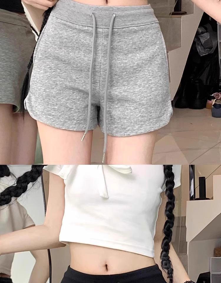 Women's Spicy Girl Black Drawstring Casual Shorts: Autumn Elastic Waist, Slit Straight Leg, Solid Color Fashion.