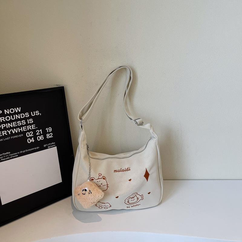 Large Capacity Bag Women's 2025 New Fashion Simple Niche Design Shoulder Messenger Bag Commuter Dumpling Bag