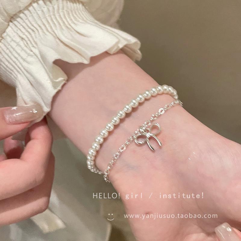 Exquisite Double-Layer Gentle French Bow Pearl Bracelet - High-End Stackable Jewelry for Women