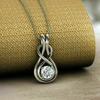 Infinity Knot Pendant Necklace with Round Cubic Zirconia