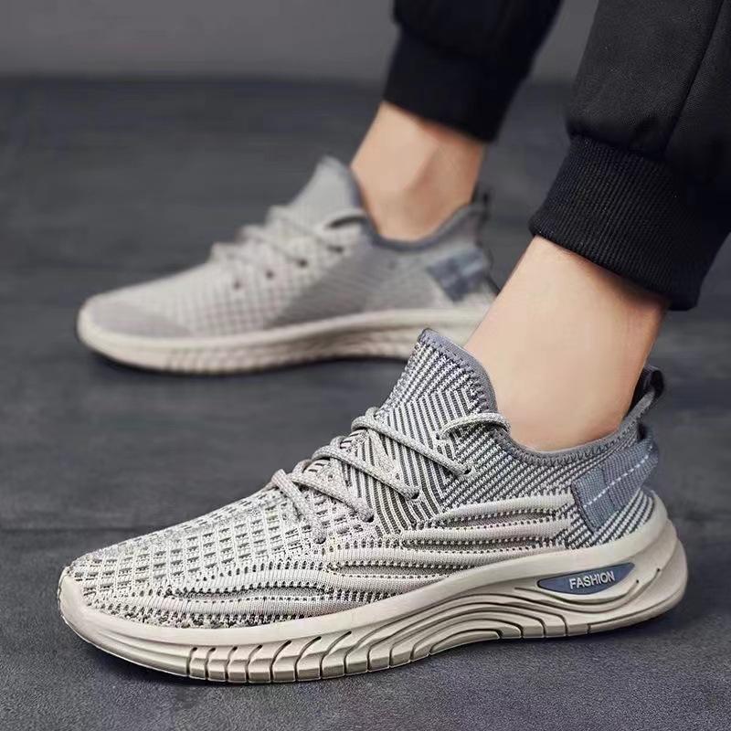 Fliegende gewebte Oberfläche atmungsaktive Freizeitschuhe Frühling und Sommer neu große Größe Herrenschuhe Low-Top runde Zehenpartie weiche Sohle Sportschuhe