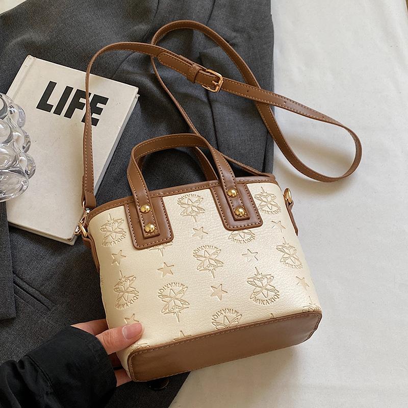 Hot-selling Korean Version of High-end Embossed Fashion Portable Bucket Bag Casual Versatile Commuter Temperament Messenger Bag Woman