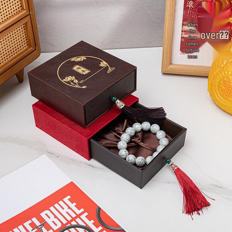 Tassel Heritage Jewelry Storage Box with Gold Silver Ornament Design