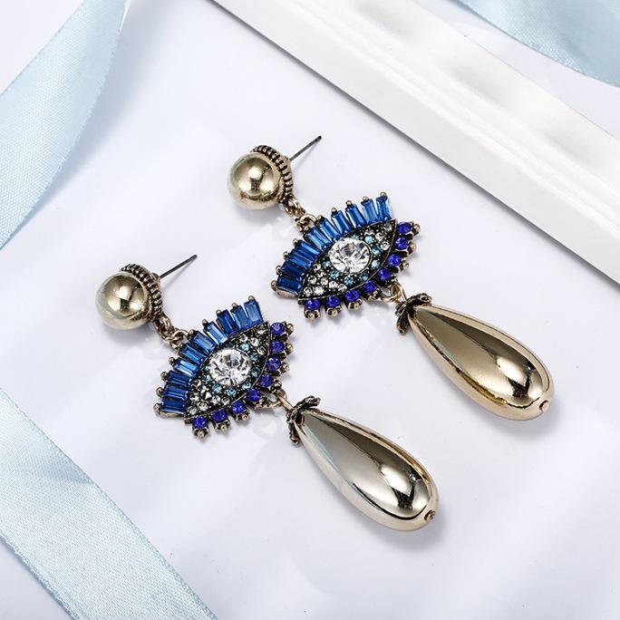 Devil's Eye Drip Oil Alloy Earrings: Trendsetting European & American Street Style