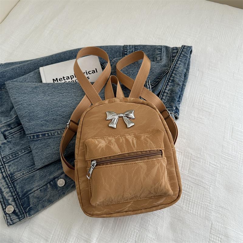 

Korean version bow double shoulder small bag women 2025 new trendy fashion backpack cute portable shoulder bag schoolbag коричневый