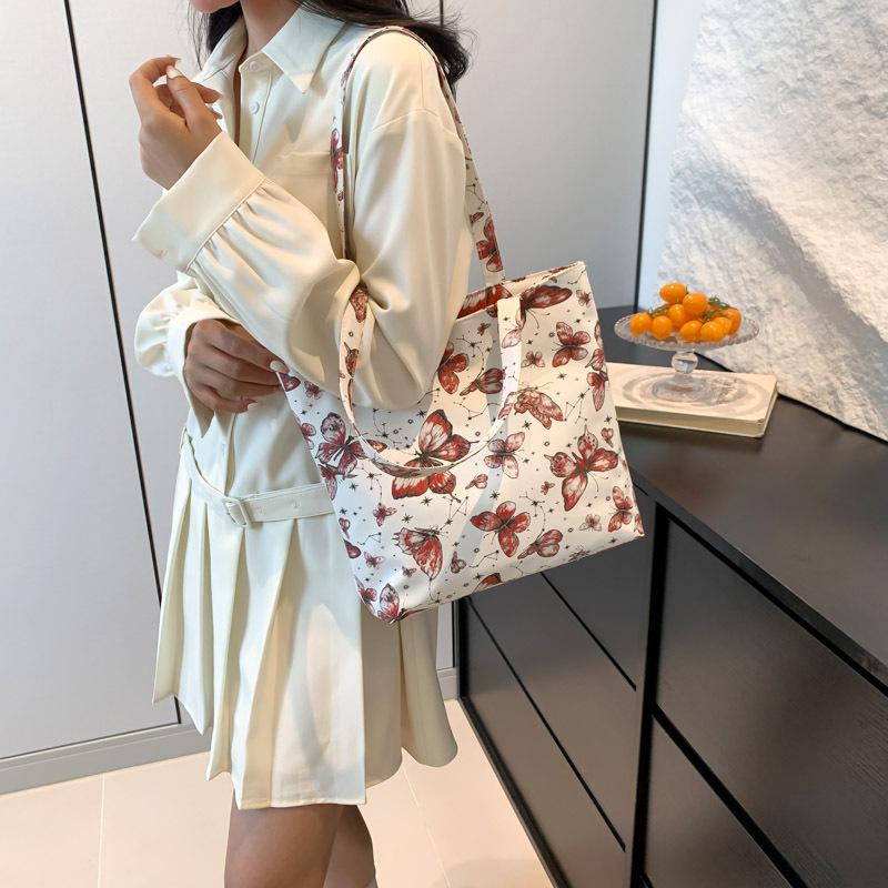 Large Capacity Tote Bag Women's New Summer Beautiful and Fashionable Simple Texture Contrasting Color Commuter Shoulder Bag