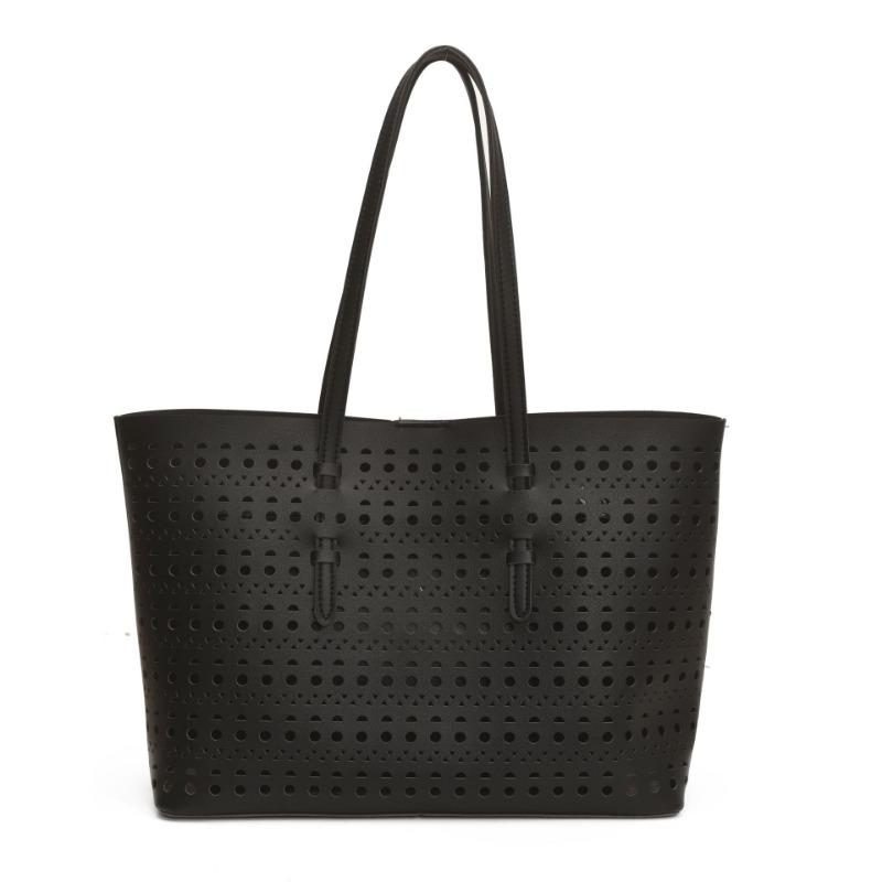 Large-capacity tote bag niche design simple hollow bag women's summer new versatile shoulder bag