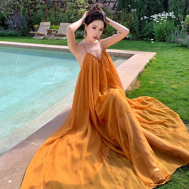 Deep v-neck suspender skirt slack pleated pendulum long skirt blue look show sexy backless dress vacation beach skirt